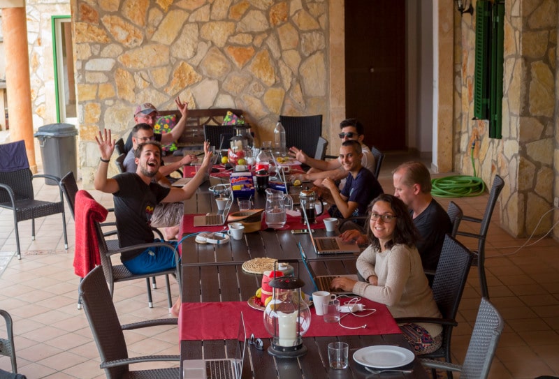 Group of people working together in a patio